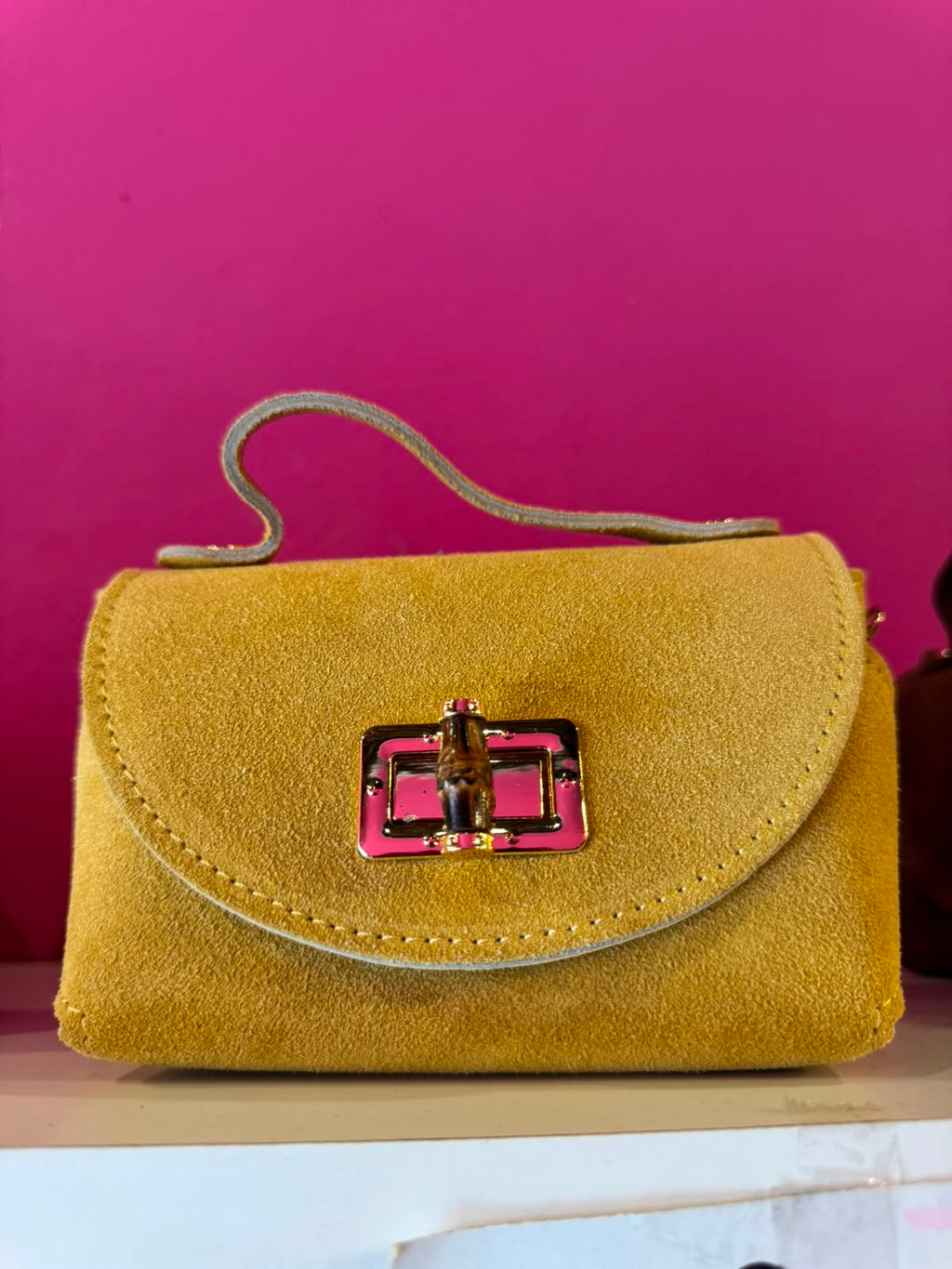 Borsa Eddy in vera pelle con tracolla metallica e inserto bambù hardware dorato