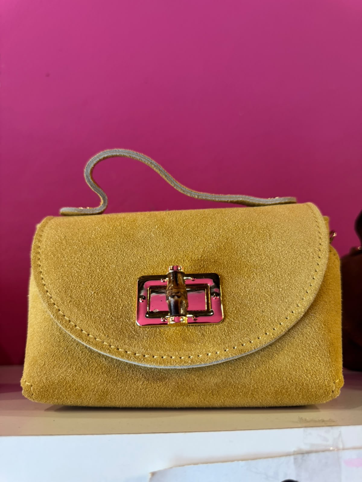 Borsa Eddy in vera pelle con tracolla metallica e inserto bambù hardware dorato