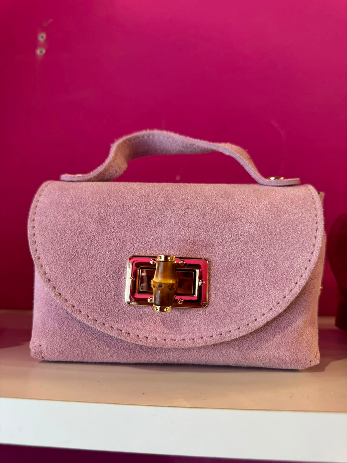 Borsa Eddy in vera pelle con tracolla metallica e inserto bambù hardware dorato