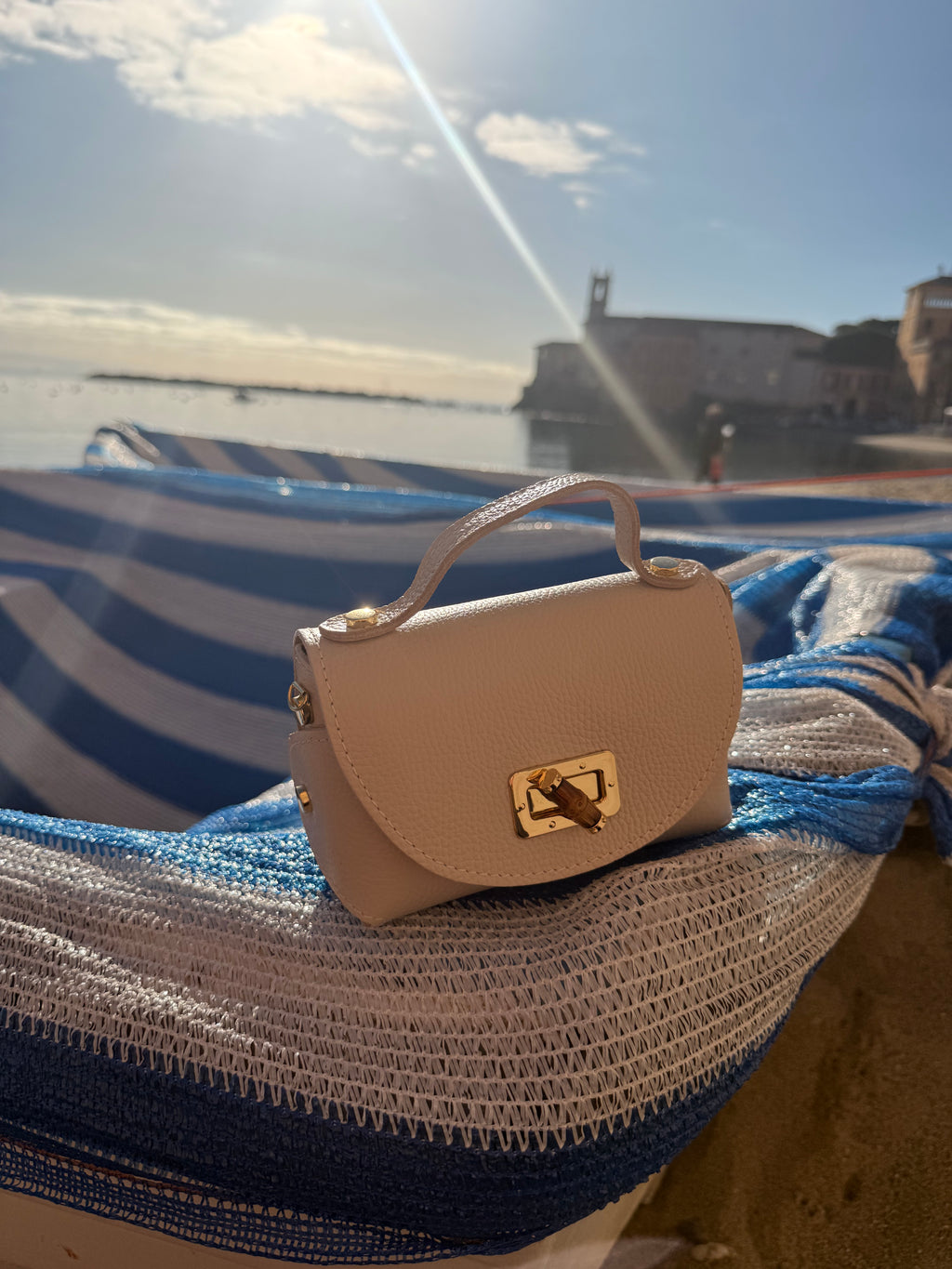 Borsa Eddy in vera pelle con tracolla metallica e inserto bambù hardware dorato