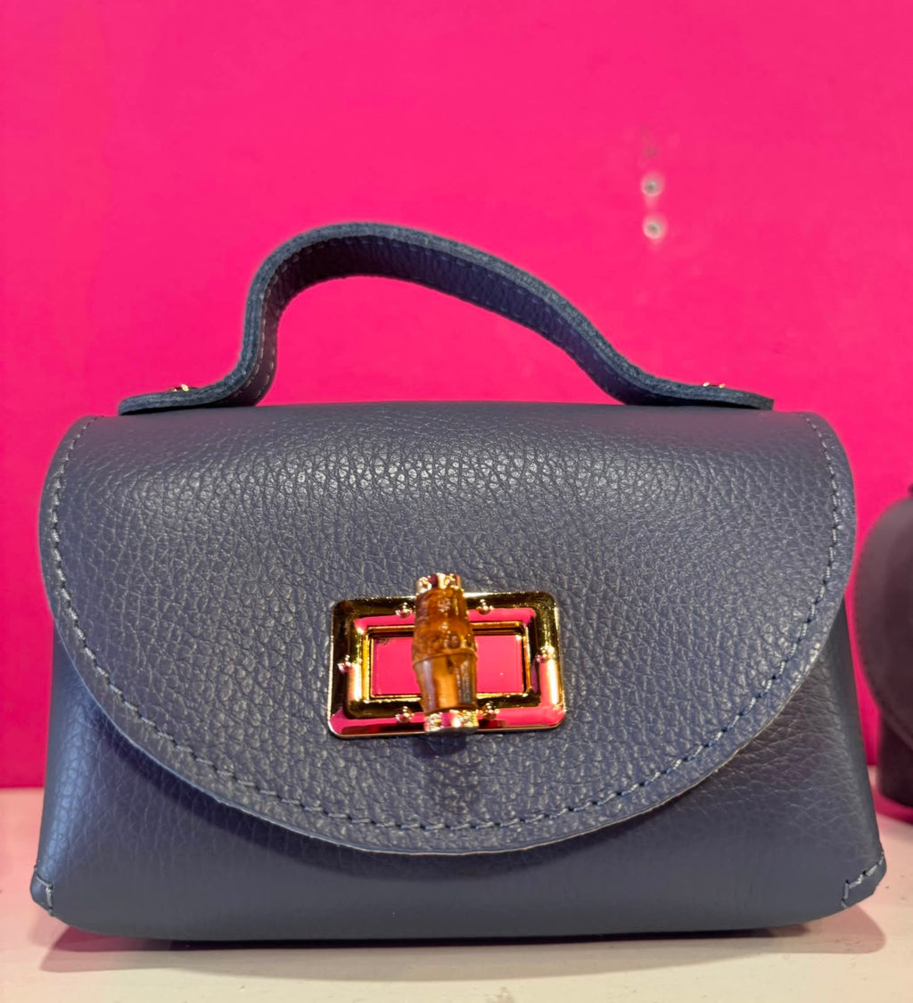 Borsa Eddy in vera pelle con tracolla metallica e inserto bambù hardware dorato