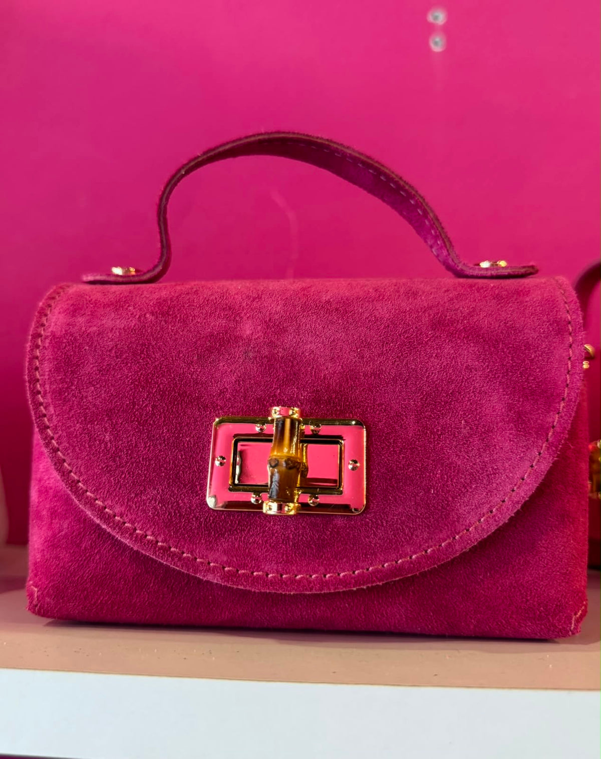 Borsa Eddy in vera pelle con tracolla metallica e inserto bambù hardware dorato