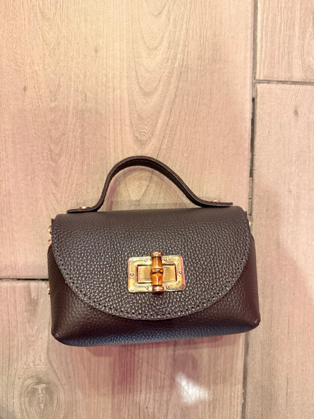 Borsa Eddy in vera pelle con tracolla metallica e inserto bambù hardware dorato