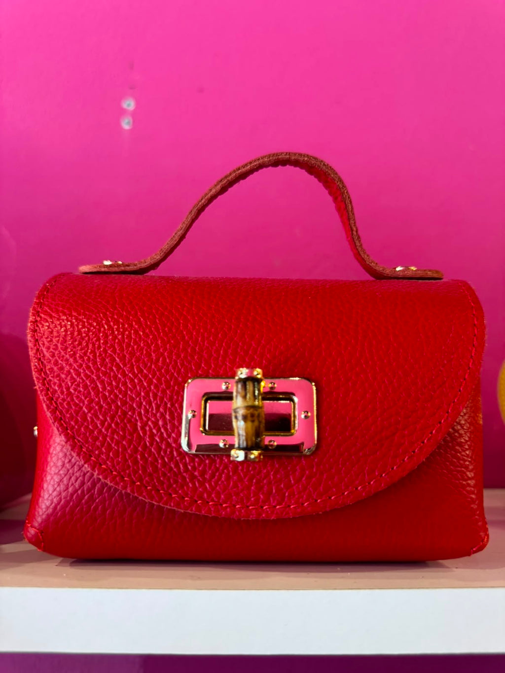 Borsa Eddy in vera pelle con tracolla metallica e inserto bambù hardware dorato