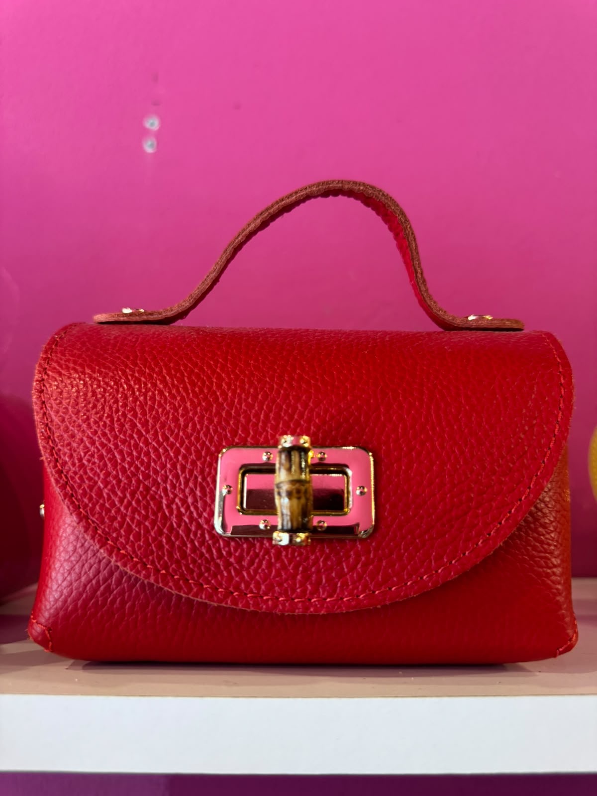 Borsa Eddy in vera pelle con tracolla metallica e inserto bambù hardware dorato