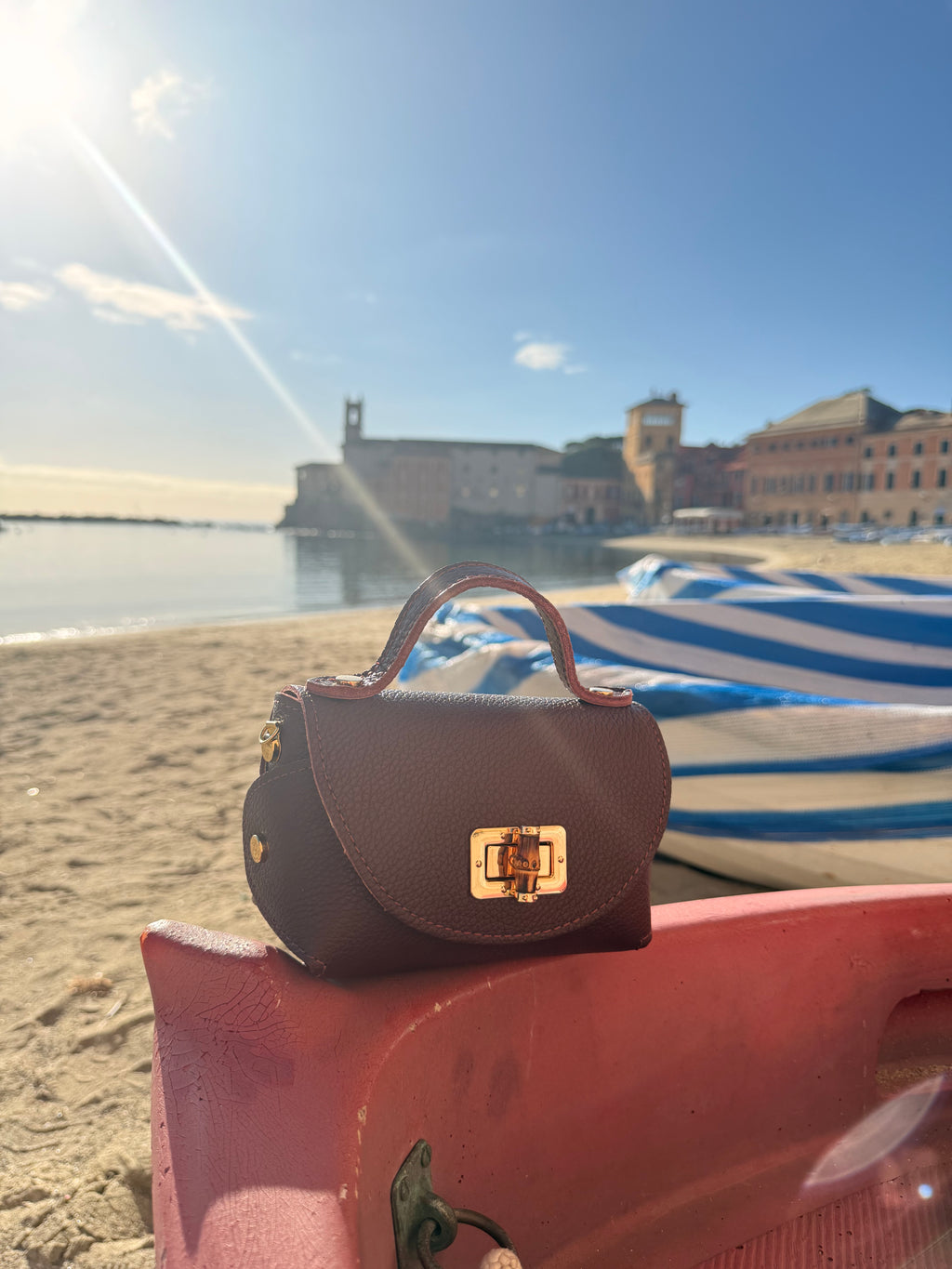 Borsa Eddy in vera pelle con tracolla metallica e inserto bambù hardware dorato