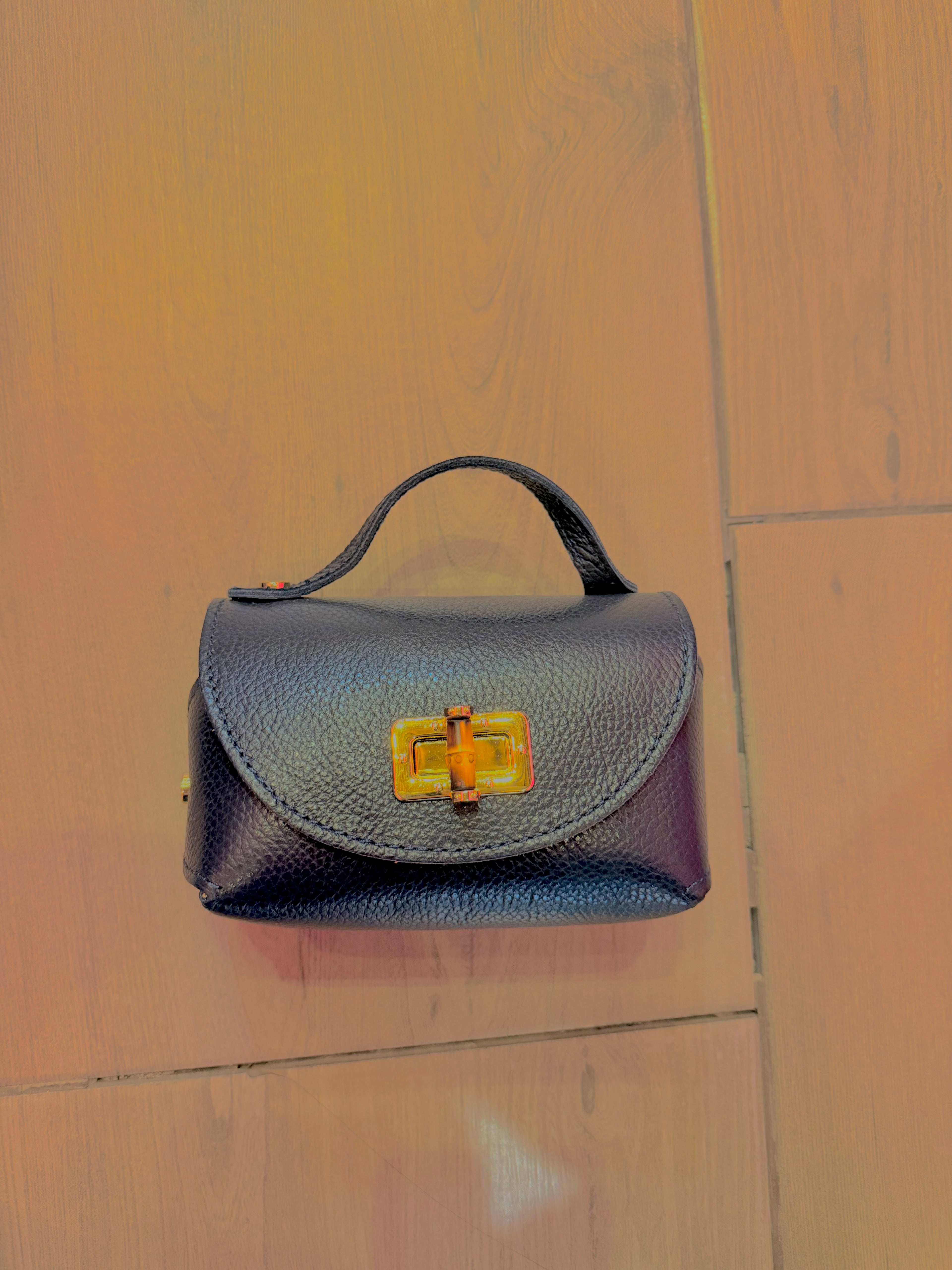 Borsa Eddy in vera pelle con tracolla metallica e inserto bambù hardware dorato