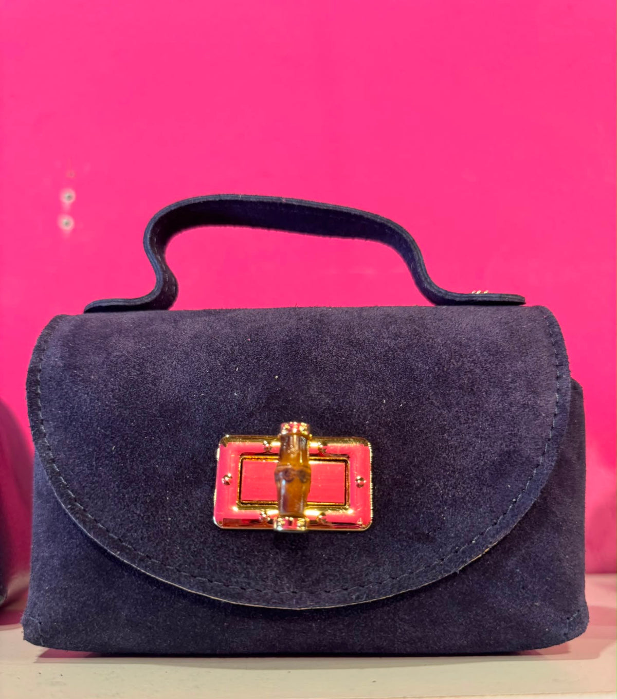 Borsa Eddy in vera pelle con tracolla metallica e inserto bambù hardware dorato